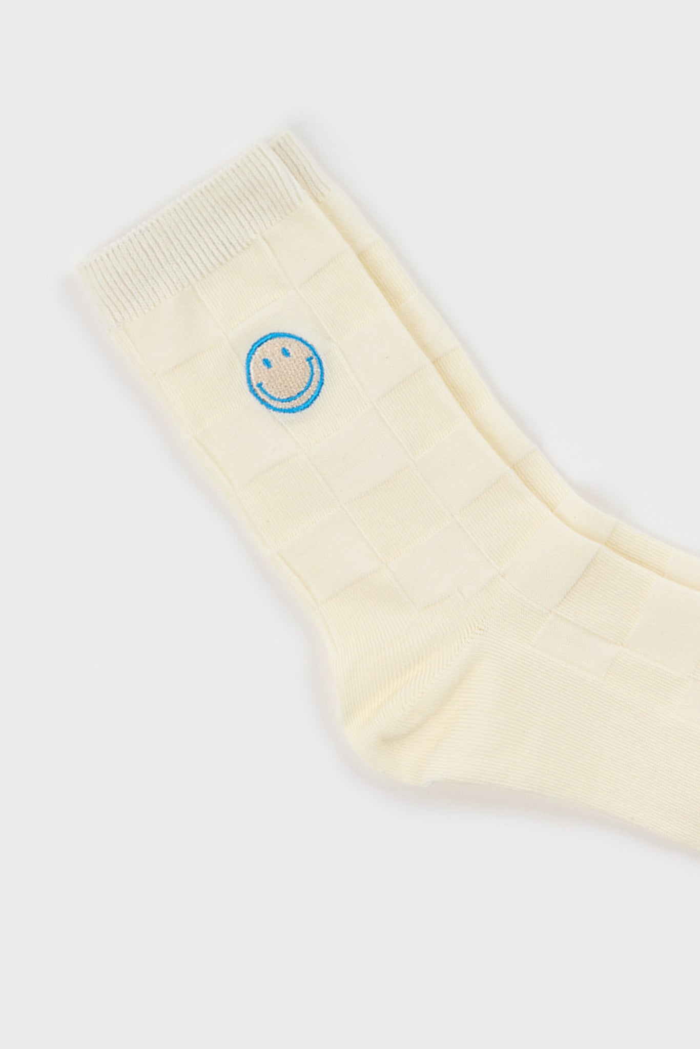 White intarsia block embroidered smiley face socks_3