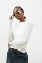White semi sheer jersey long sleeve top_1