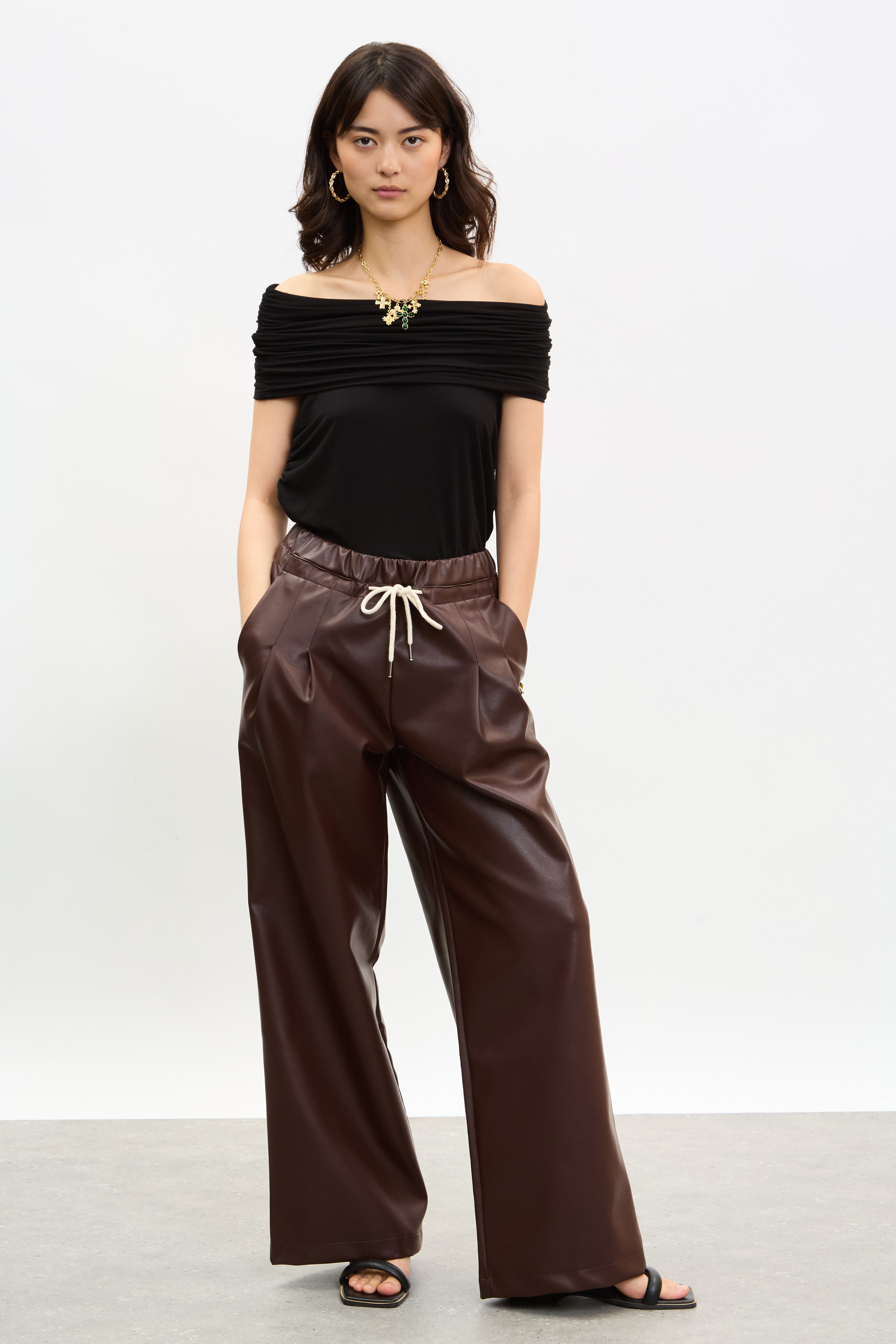 Burgundy vegan leather pleated drawstring trousers Glassworks London