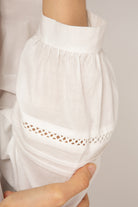 White ruffle trim blouse_8