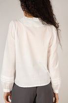 White ruffle trim blouse_4